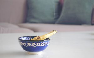 palo santo incense stick in a bowl